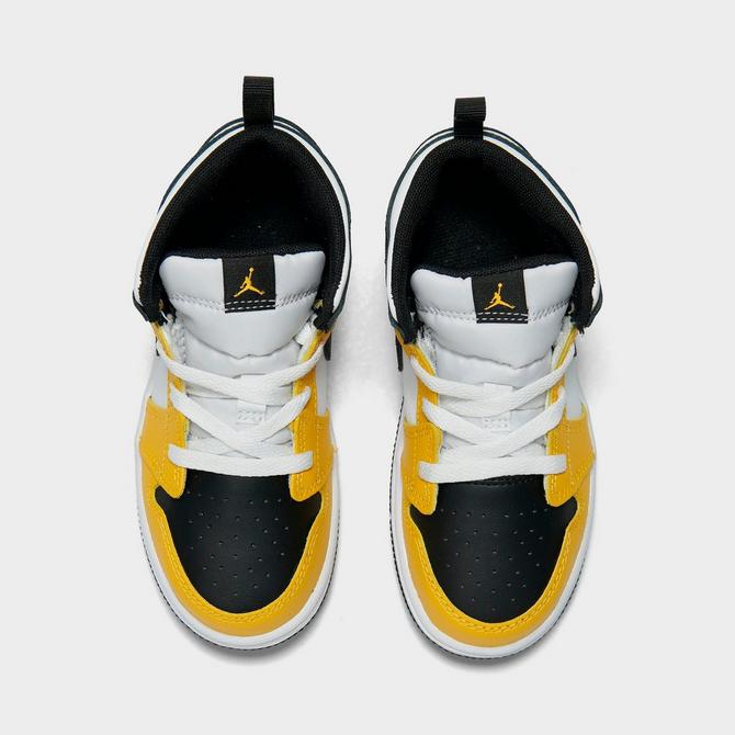 Kids black clearance and yellow jordans