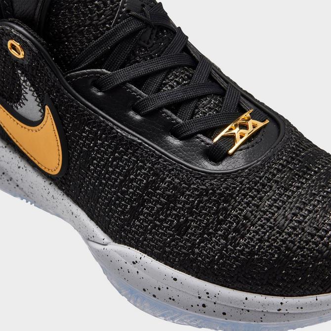 Black and best sale gold kids nikes