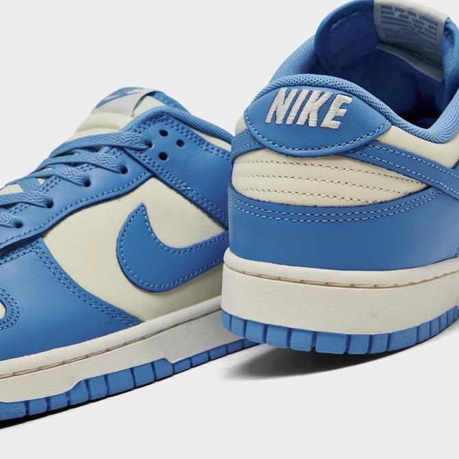 Front view of Nike Dunk Low Retro Casual Shoes in Coconut Milk/University Blue/Sail/White Click to zoom