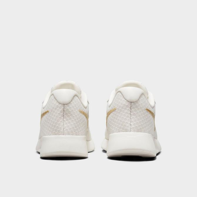 Nike tanjun off on sale white