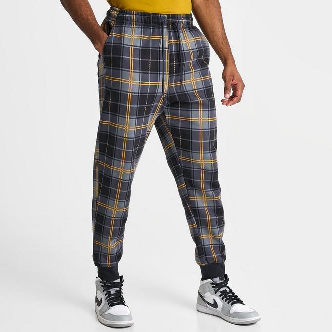 Jordan Essentials Holiday Fleece Pants.