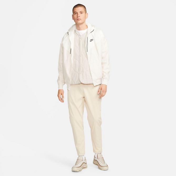 [angle] view of Men's Nike Club Woven Tapered Pants in Sanddrift/White Click to zoom