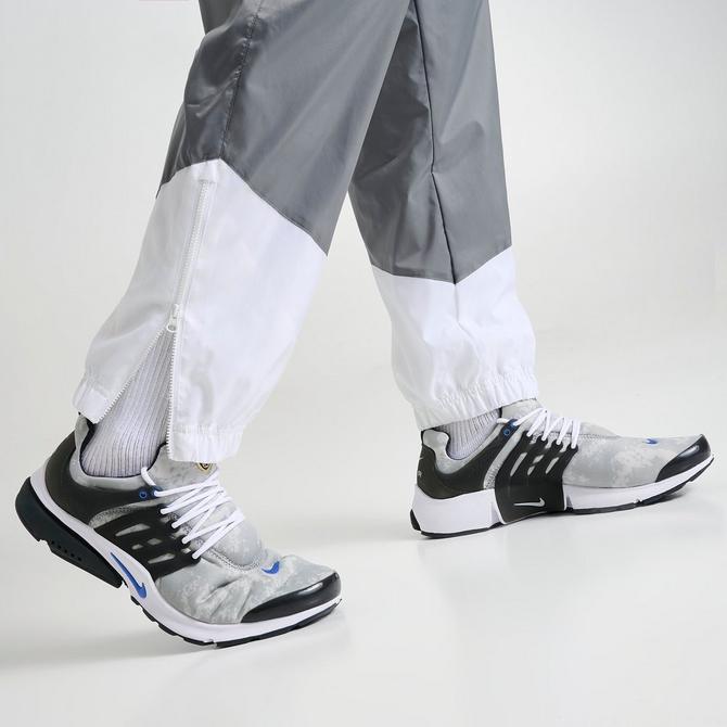 Grey nike windrunner pants deals