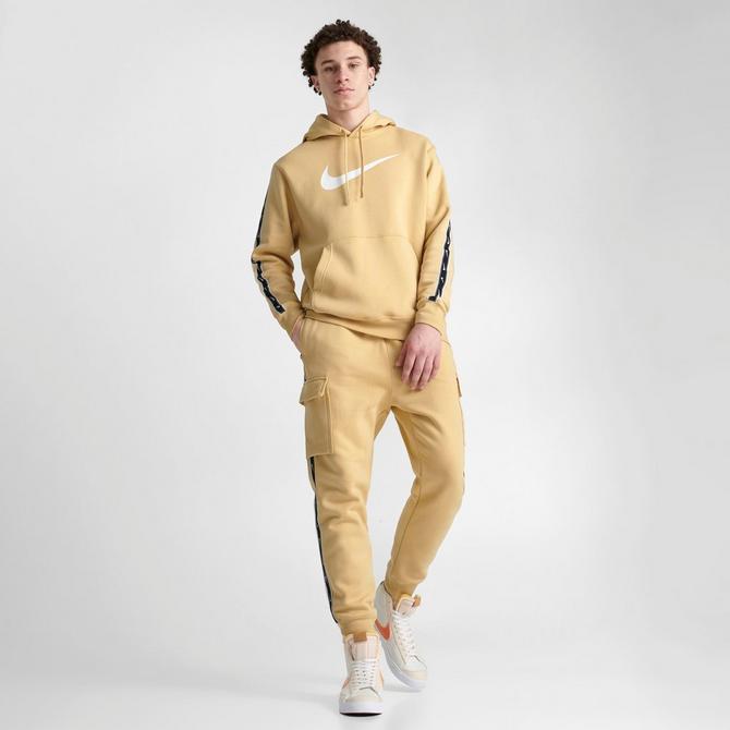 nike repeat logo taping cargo joggers in black