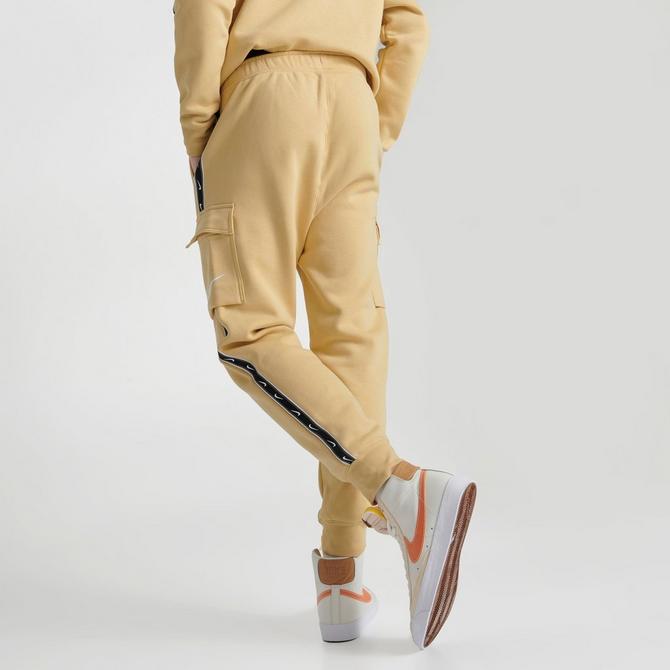nike repeat logo taping cargo joggers in black