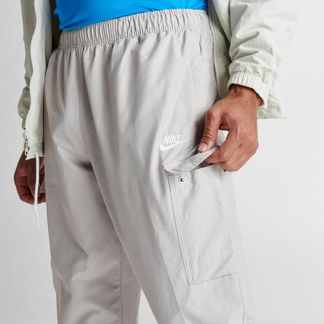 Nike logo woven discount joggers in stone