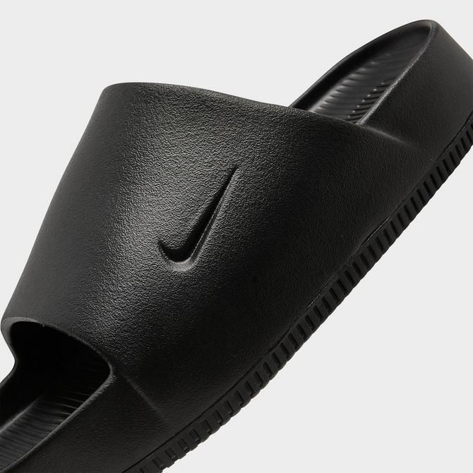 Black on black online nike slides