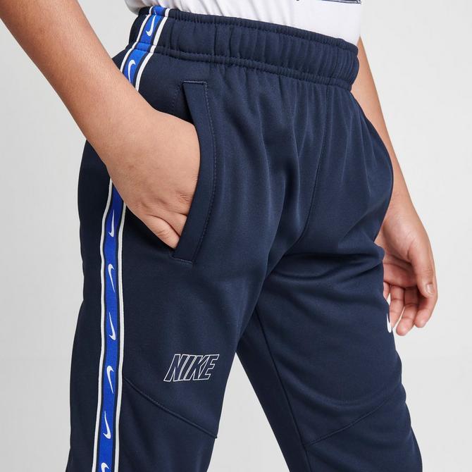 Boys navy hot sale nike joggers