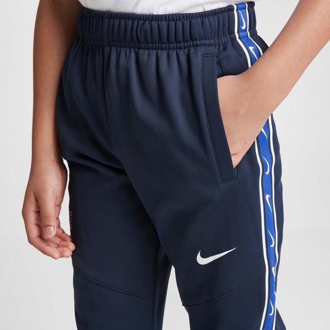 Nike on sale poly pants