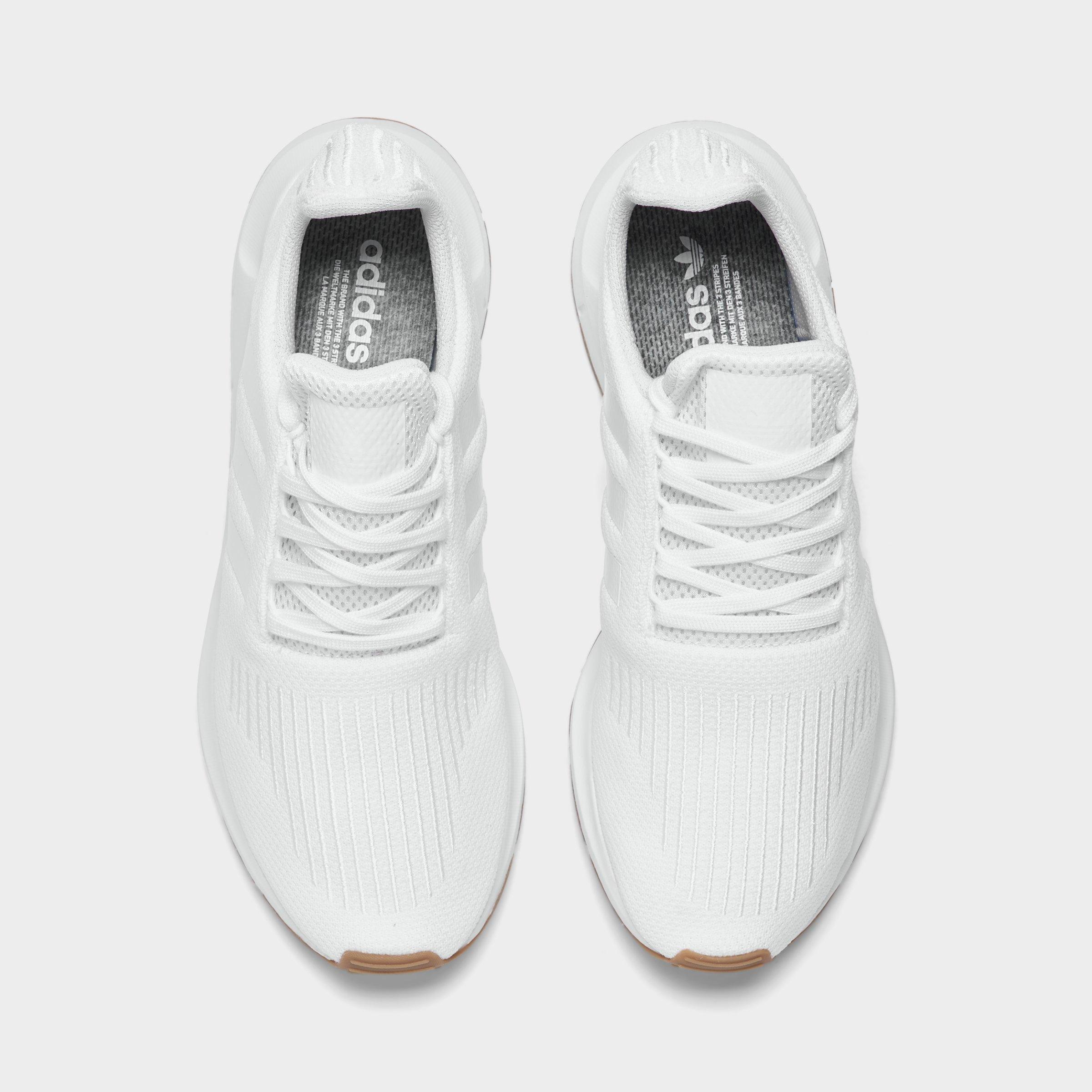 all white swift run shoes