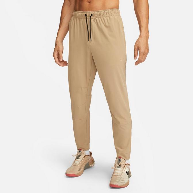 Nike Running Dri-FIT Challenger woven pants in khaki