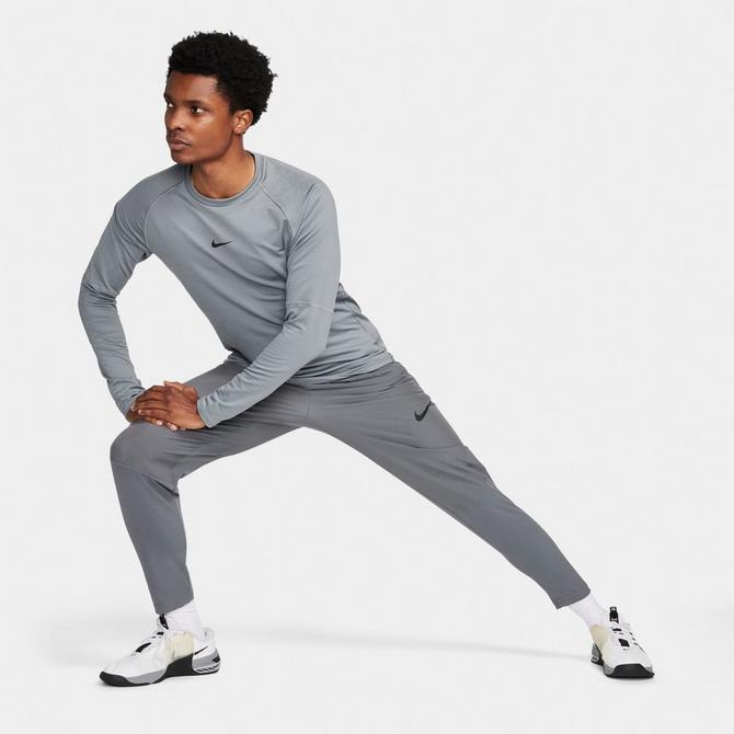 Nike pro warm long sleeve training top hotsell