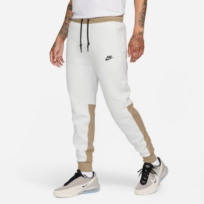 Nike Sportswear AIR PANT - Tracksuit bottoms - black/summit white