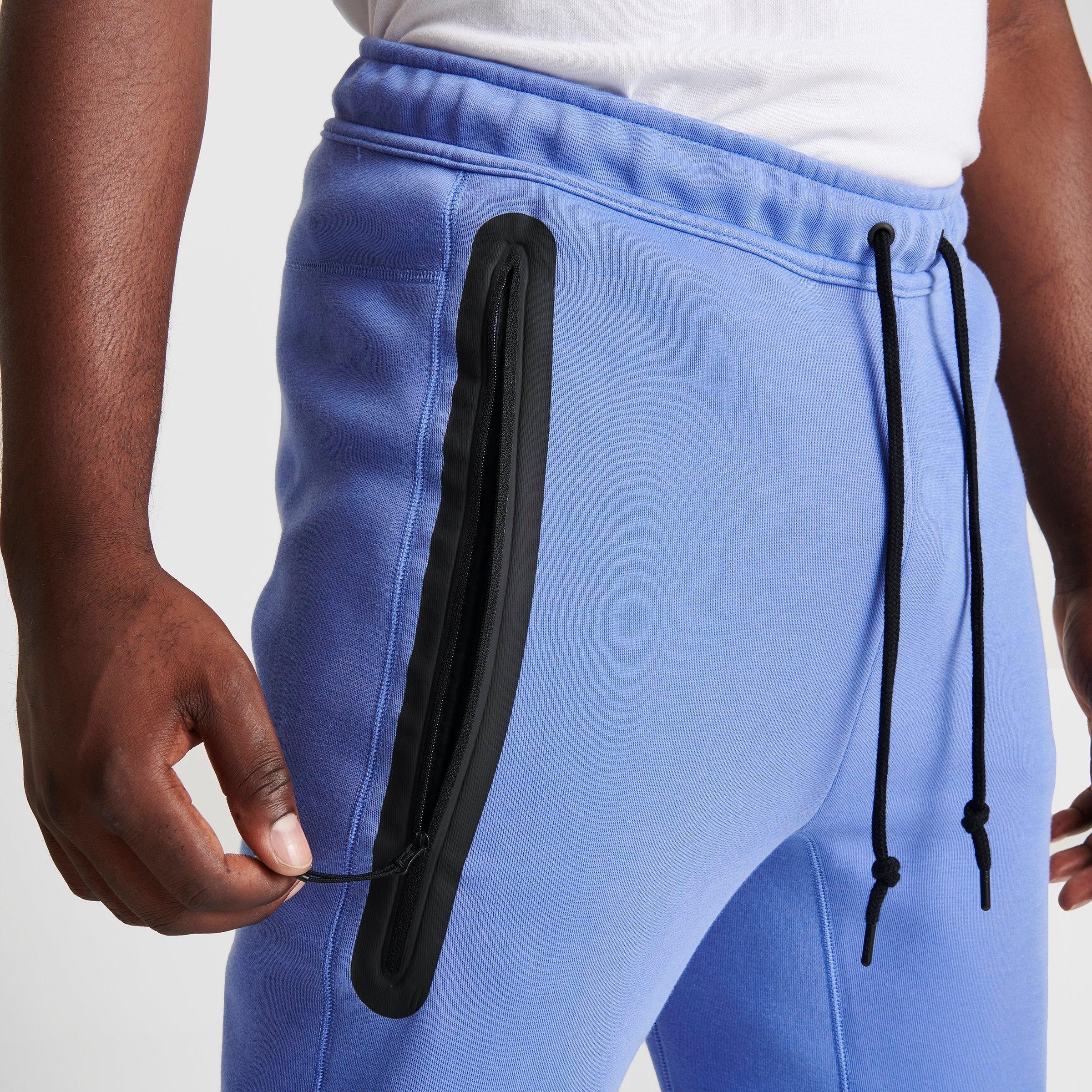 blue nike pants joggers