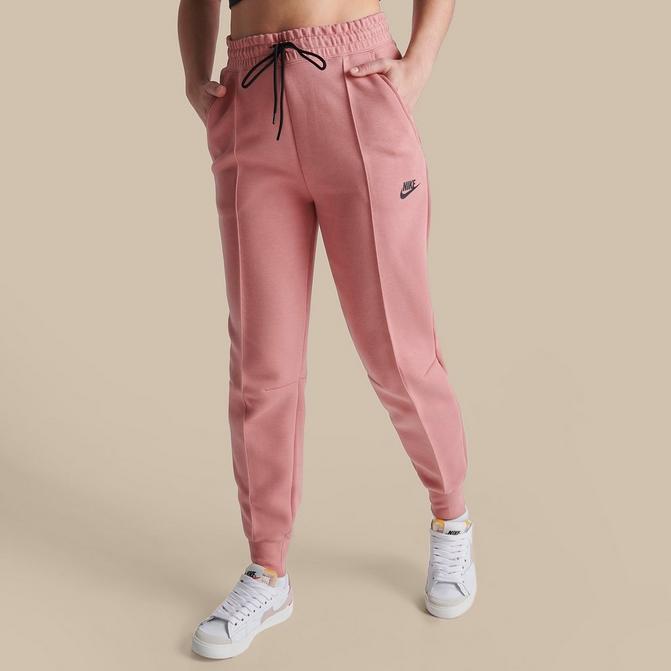 Black and pink online nike joggers