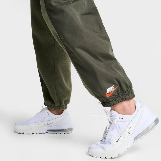 Nike swoosh cuffed best sale woven sweatpants in khaki