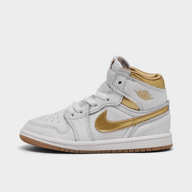 Kids gold jordans on sale