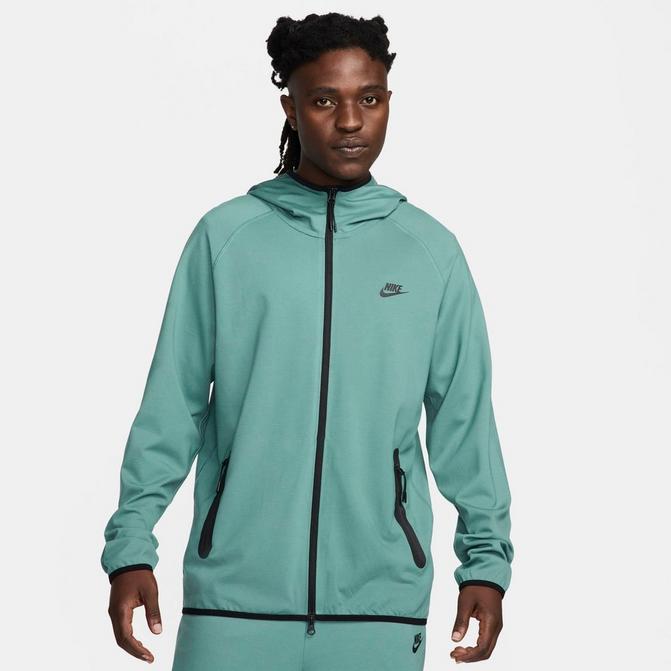 Nike jacket with zipper pockets best sale