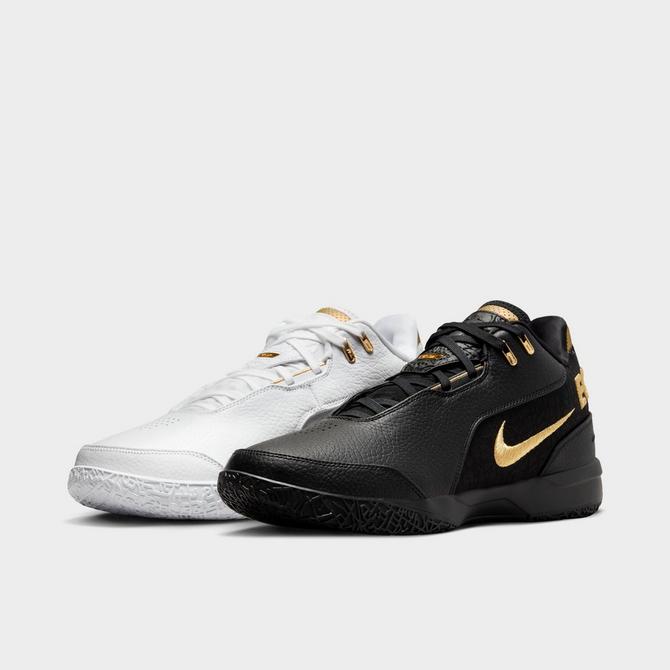 Three Quarter view of Nike LeBron NXXT Gen AMPD Basketball Shoes in White/Black/Gold Click to zoom