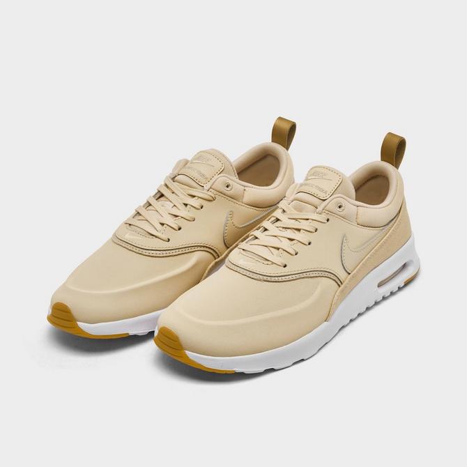 Nike thea beige clearance leather