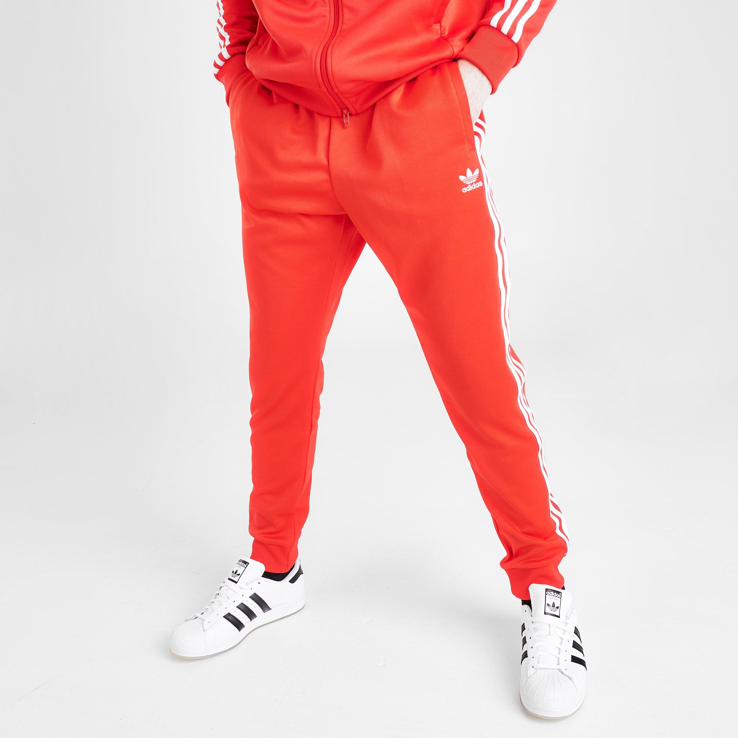 adidas sst track pants mens red