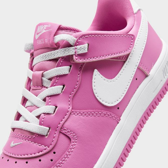 Nike pink trainers kids best sale