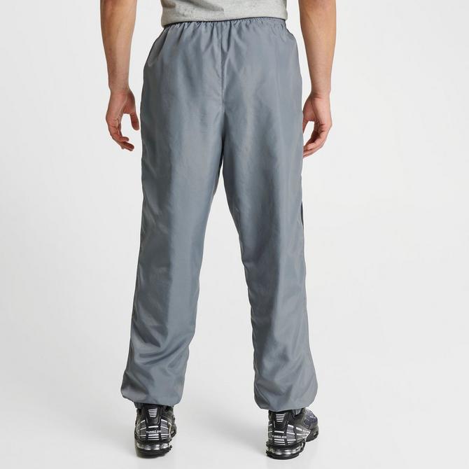 Nike air logo 2025 track pants grey