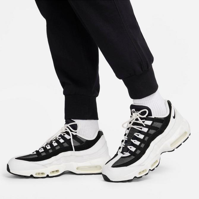 [angle] view of Men's Nike Club Knit Jogger Pants in Black/White Click to zoom