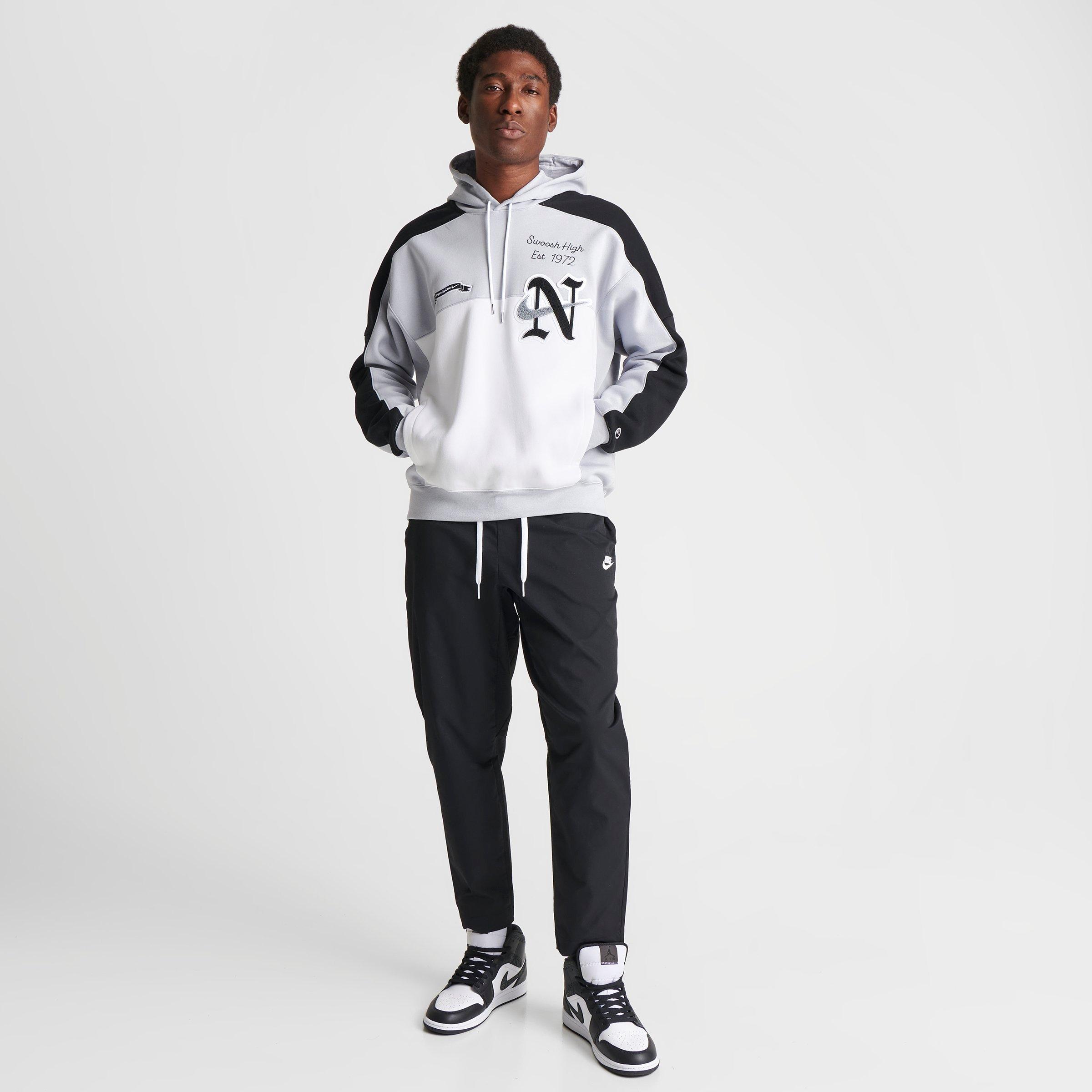 nike sportswear tracksuit black
