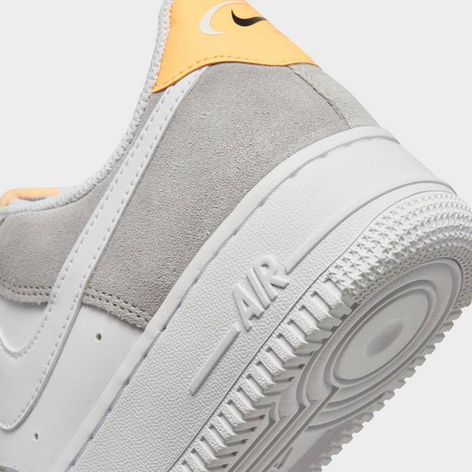 Nike AF1 PLT.AF.ORM trainers in grey and gold