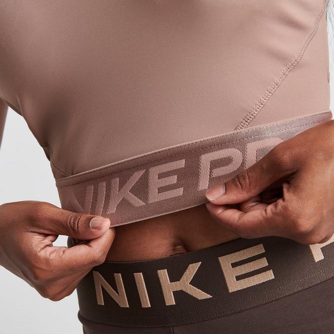 Nike pro store intertwist rose gold