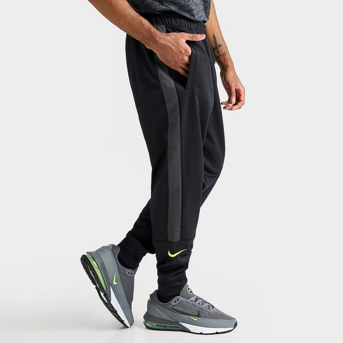 Nike Performance HERITAGE PANT - Tracksuit bottoms - black 