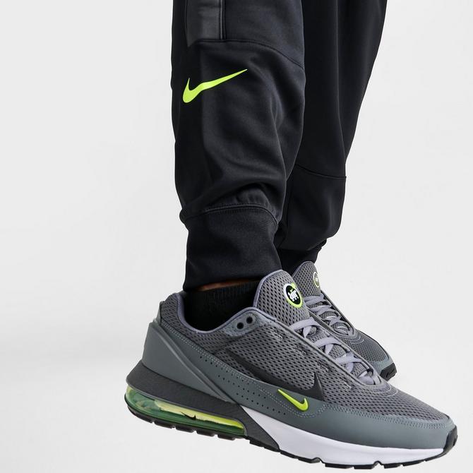 Nike swoosh logo cuffed joggers hot sale