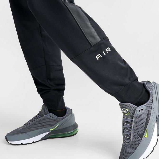 Nike swoosh joggers black best sale and white