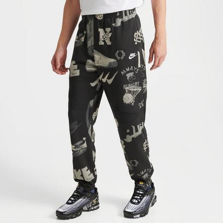 Nike sportswear all clearance over print track pants