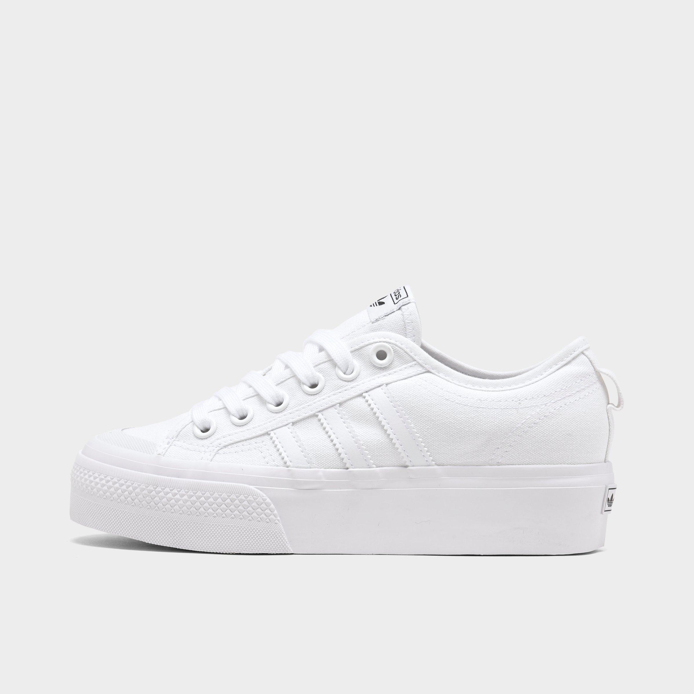 white adidas platform sneakers