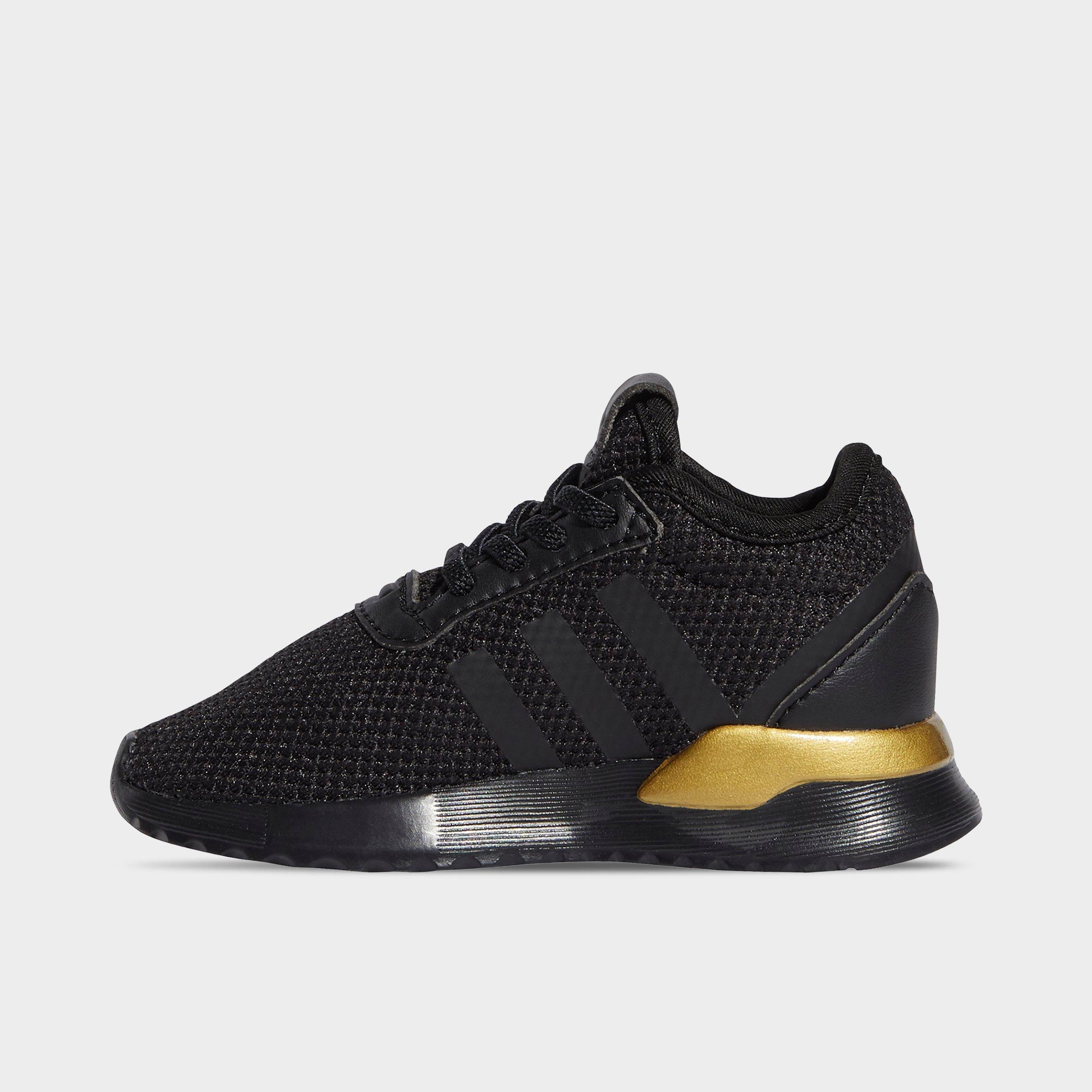 black and gold adidas shoes