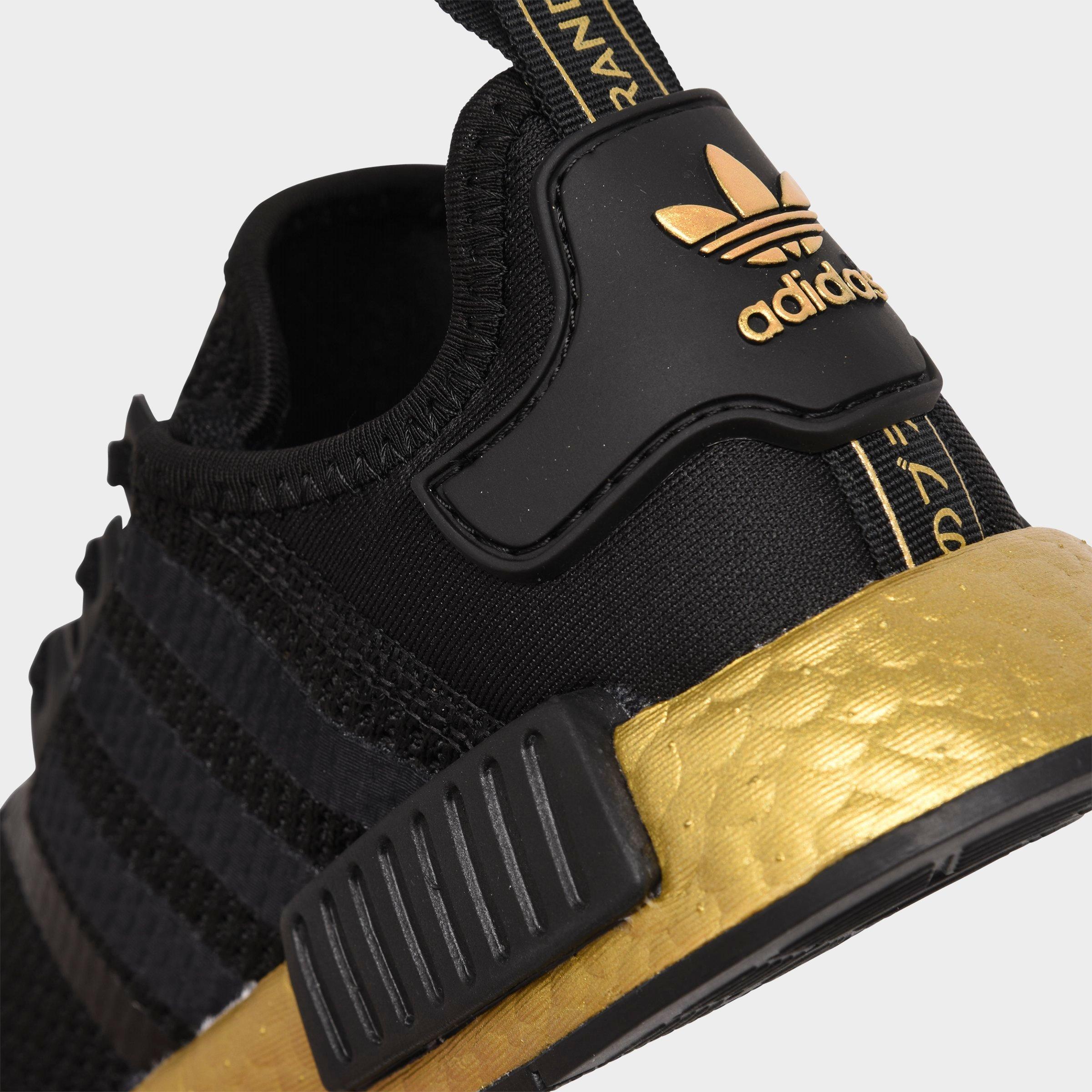 black and gold adidas nmd
