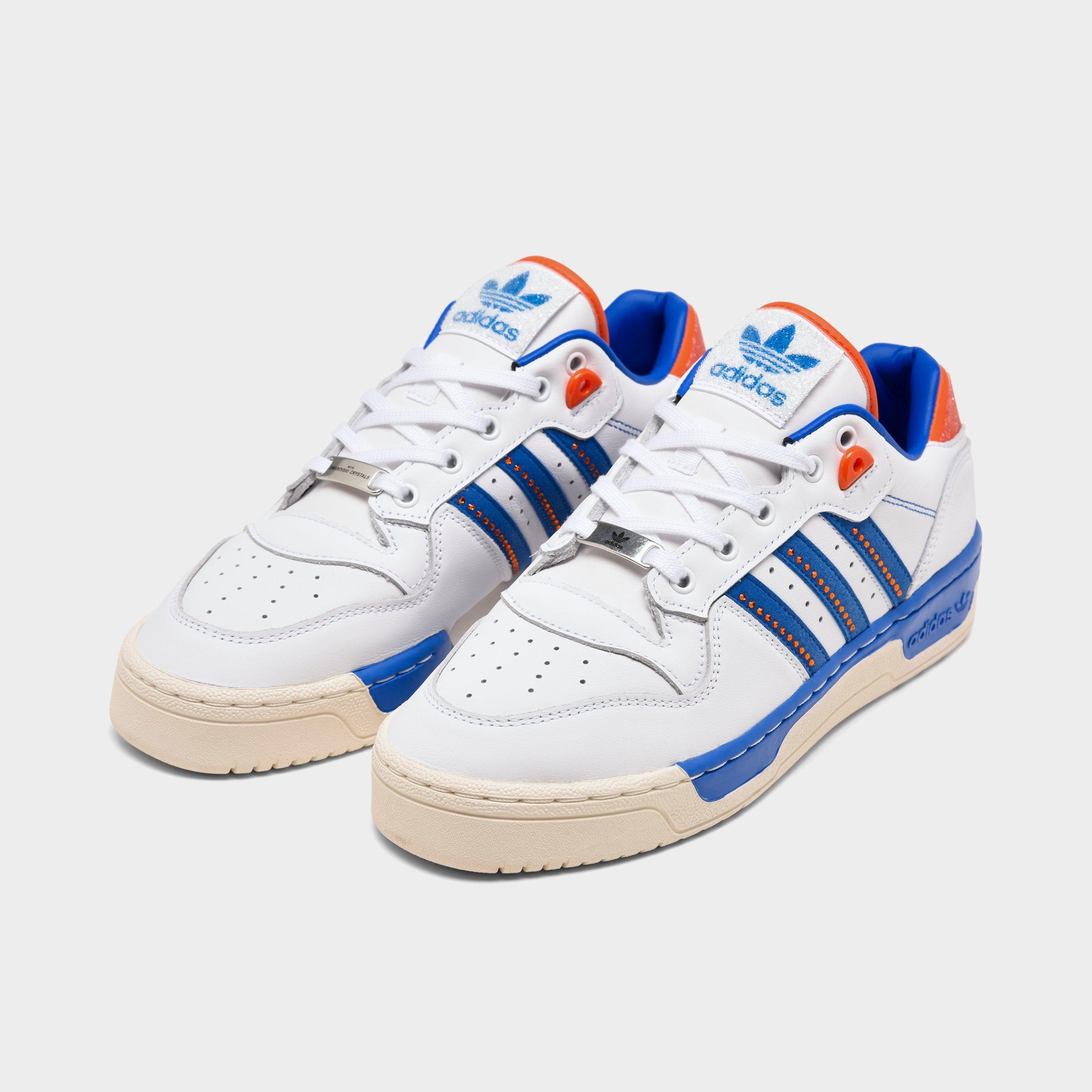adidas originals rivalry low trainer in blue and pink