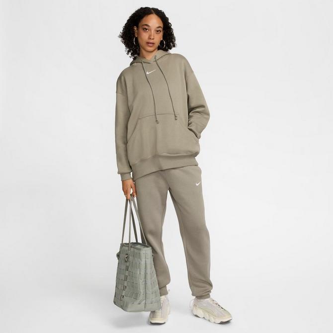 [angle] view of Women's Nike Sportswear Phoenix Fleece Mid-Rise Jogger Sweatpants in Light Army/Sail Click to zoom
