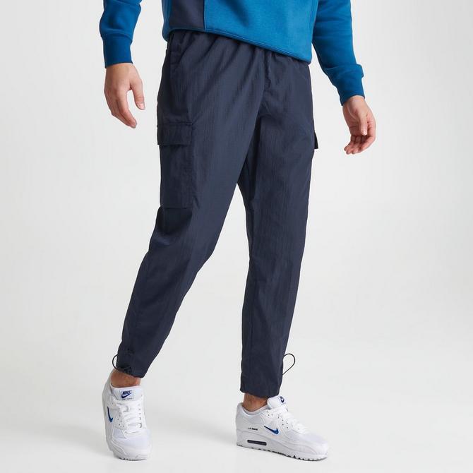 Nike Trend Woven baggy Parachute Pants in Blue