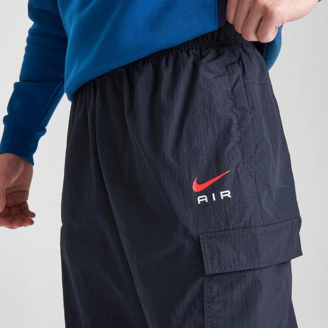 Nike Trend Woven baggy Parachute Pants in Blue