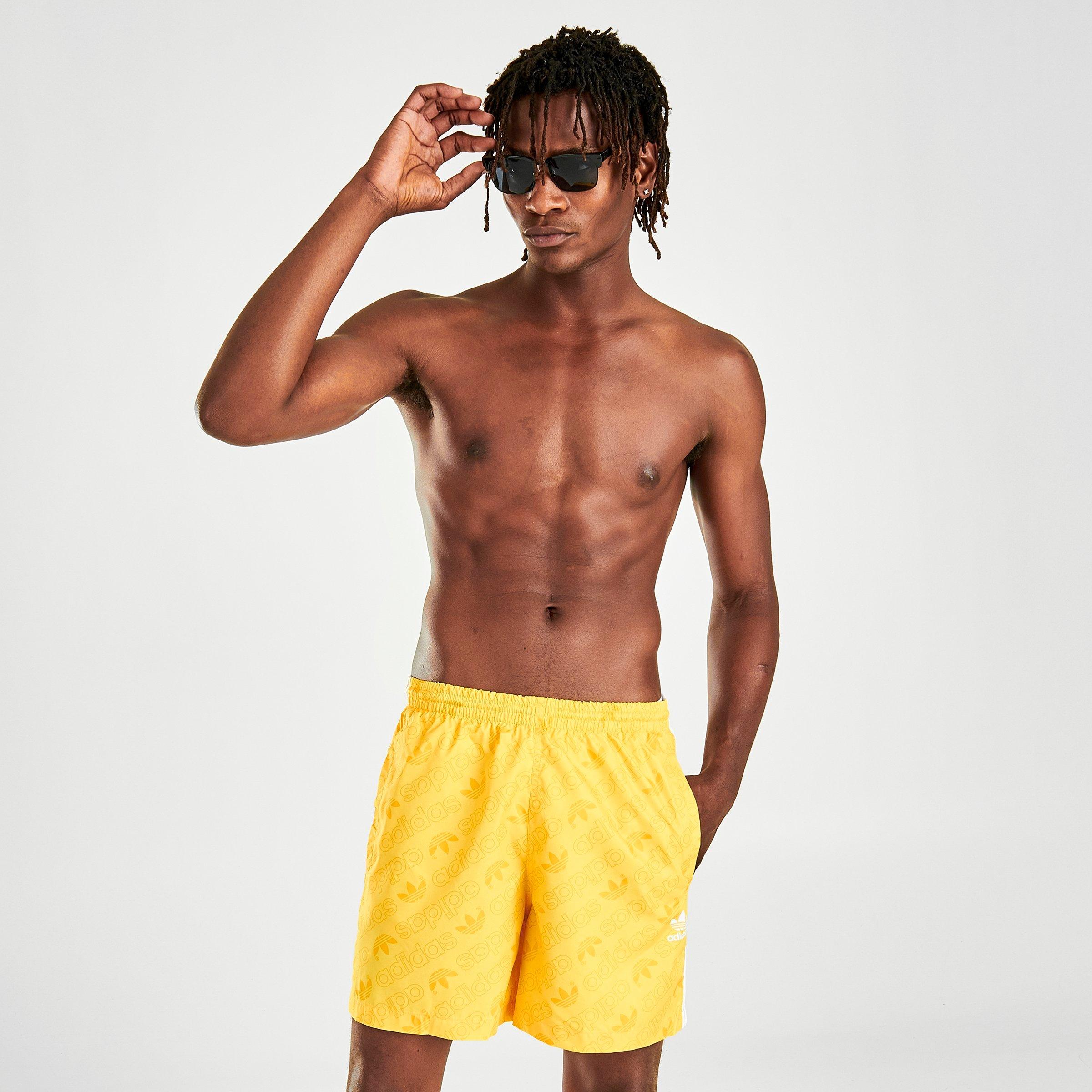 yellow adidas swim shorts