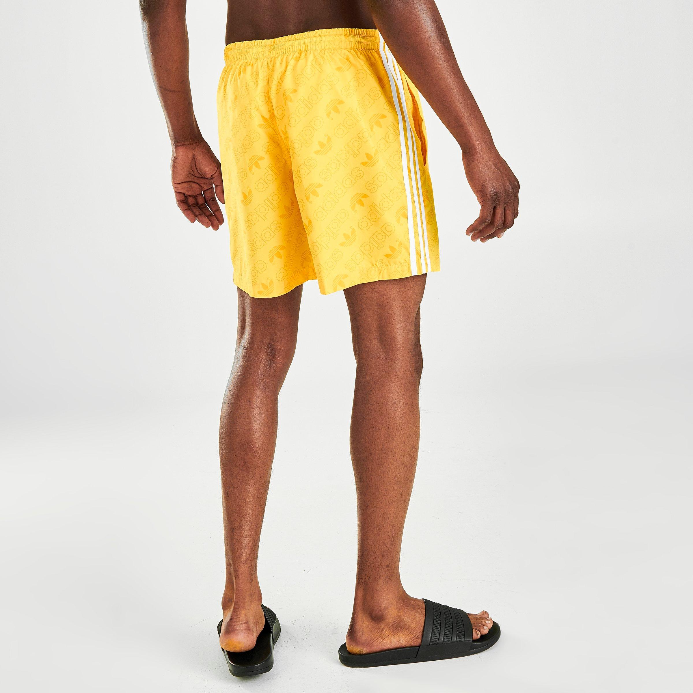 yellow adidas swim shorts