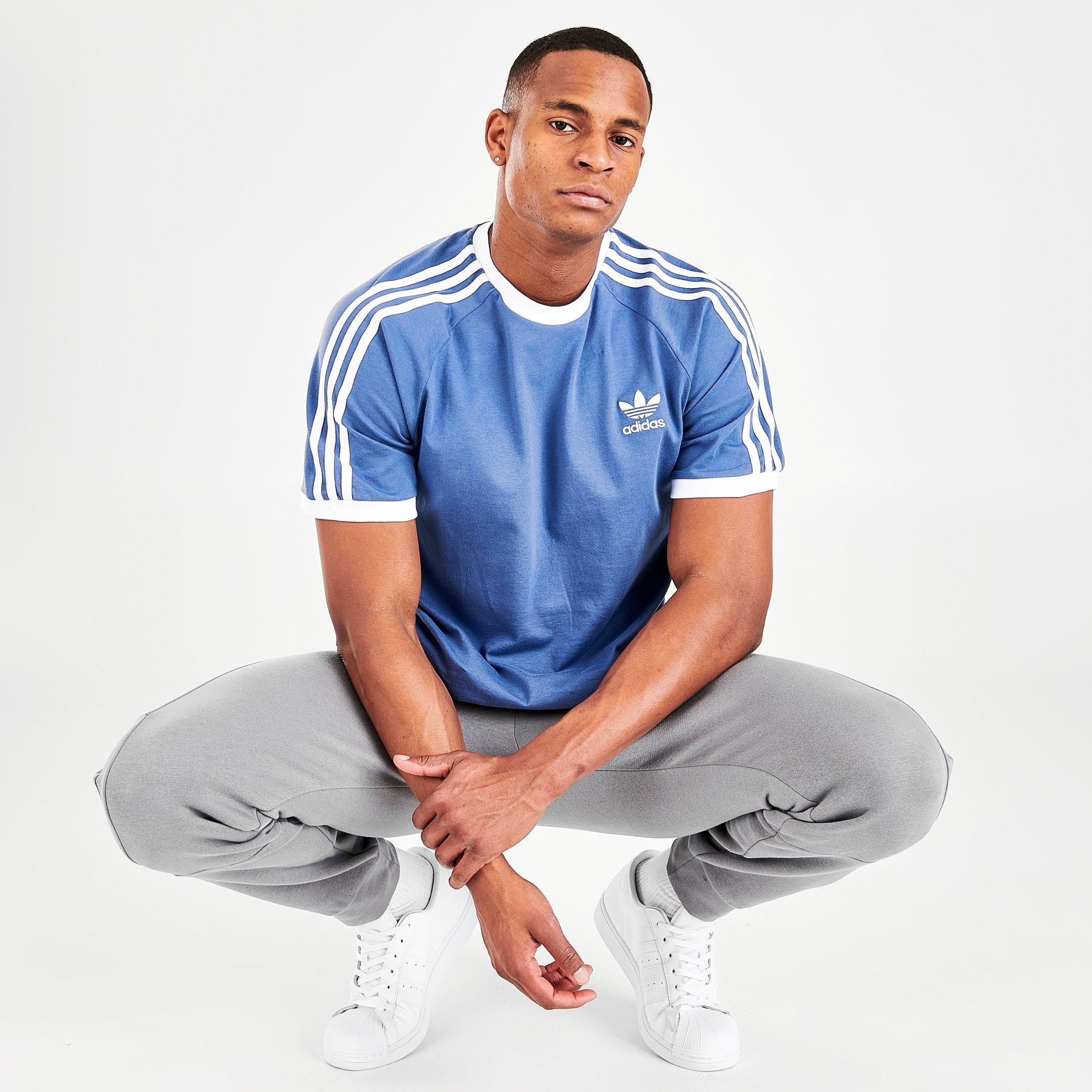 adidas track pants light blue