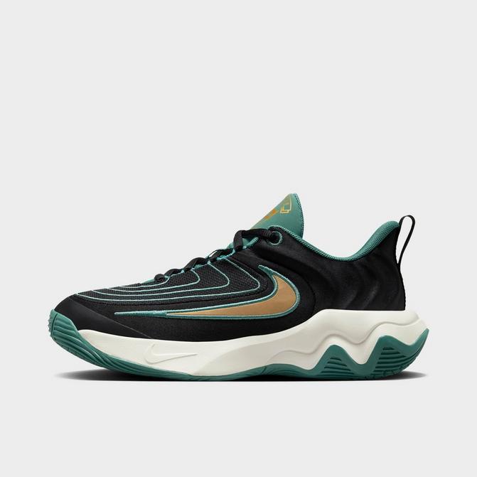 Right view of Big Kids’ Nike Giannis Immortality 4 Basketball Shoes in Black/Metallic Gold/Bicoastal/Pale Ivory Click to zoom