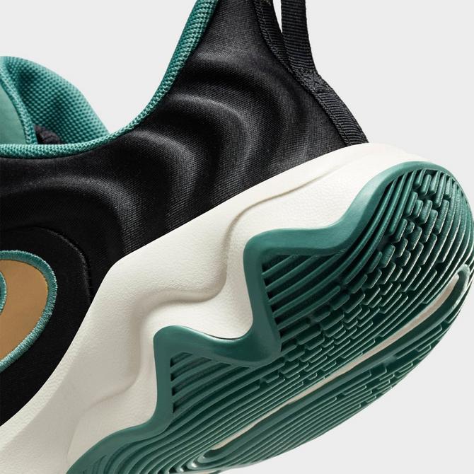 Front view of Big Kids’ Nike Giannis Immortality 4 Basketball Shoes in Black/Metallic Gold/Bicoastal/Pale Ivory Click to zoom