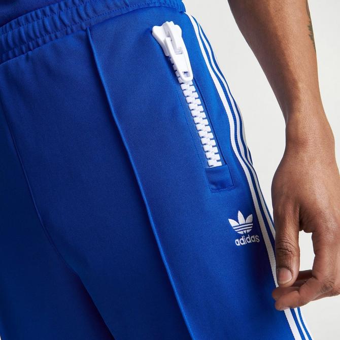 Adidas track pants hot sale with zip pockets