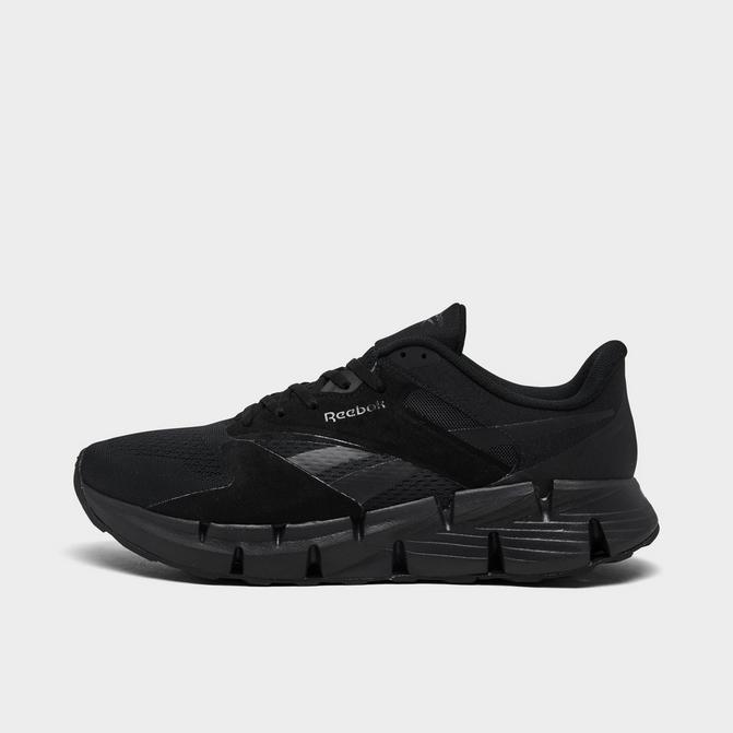 Reebok black sports shoes online