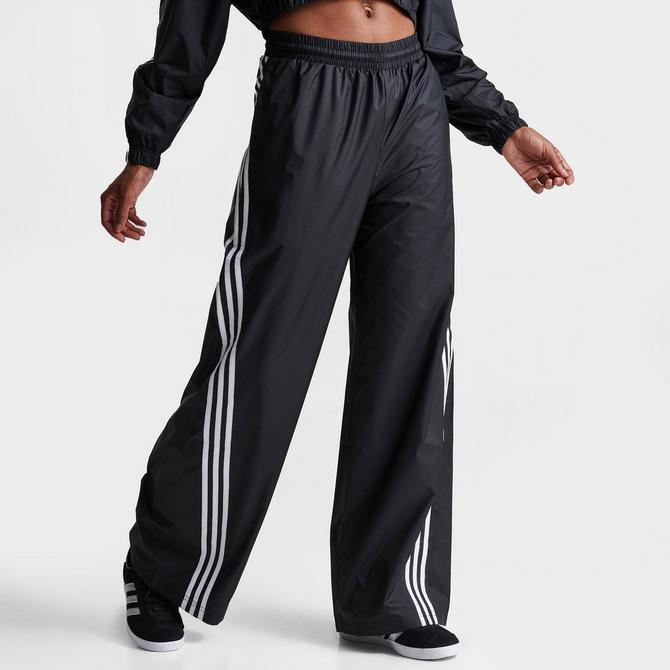 Adidas pants with line in store the back